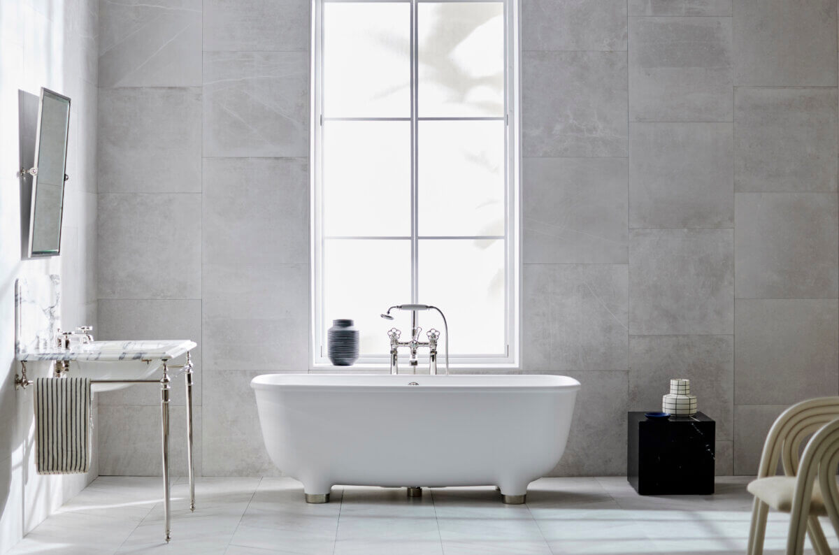 white bathtub in gray bathroom