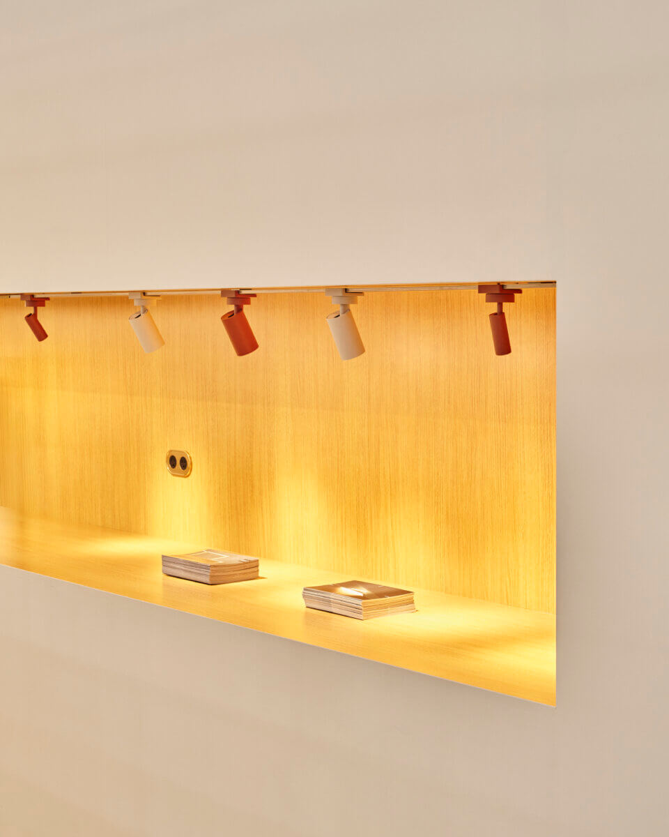 A contemporary lighting display in the Juniper Recharge lounge at ICFF 2025