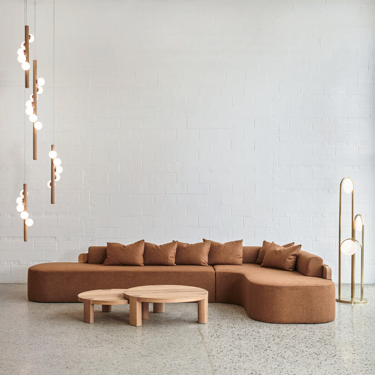 Riverside Sofa, Levee Coffee Table, Vertical Willow Pendants, Ellipse Floor Lamp, image courtesy of hollis+morris