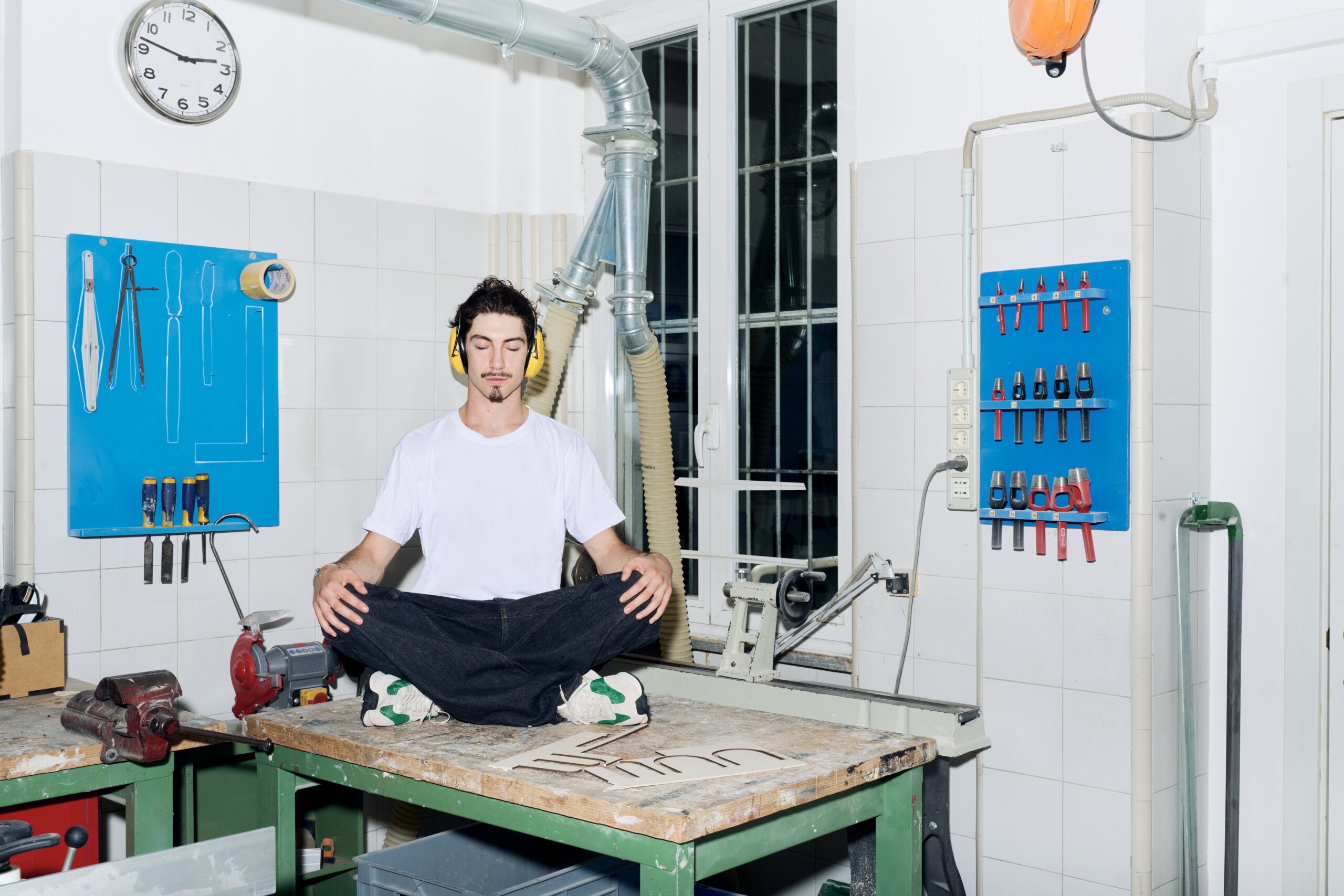 An ICFF attendee reviews a book in the ICFF Library