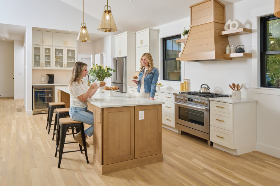 Fabuwood Cabinets, women talking in kitchen
