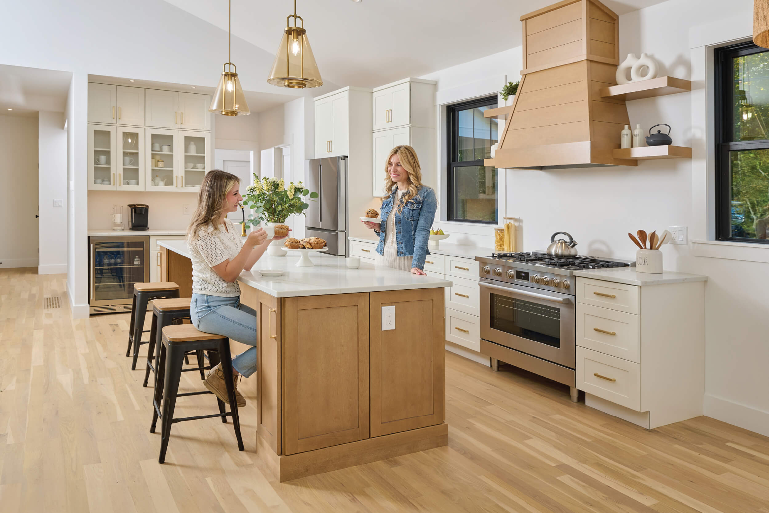 Fabuwood Cabinets, women talking in kitchen