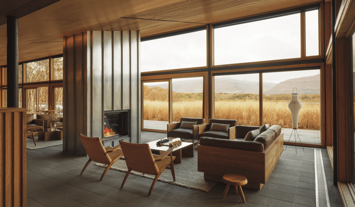 Piaule Main House Lobby, featuring earth tones and wooden furniture